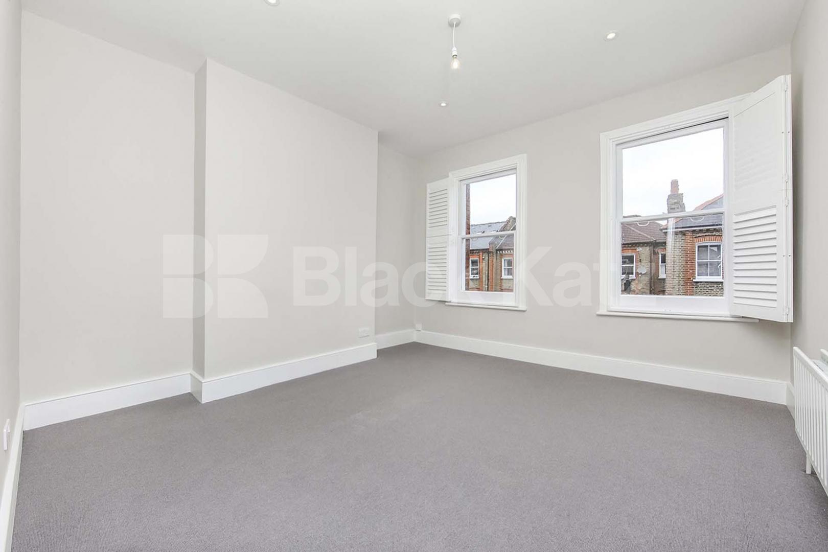 Triplex & offering 1160 Sq. Ft. of living & entertaining space Kendoa Road, Clapham